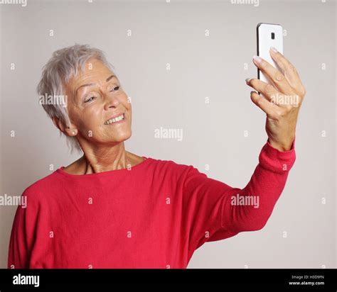 Mature Woman Taking Selfie Smartphone Hi Res Stock Photography And