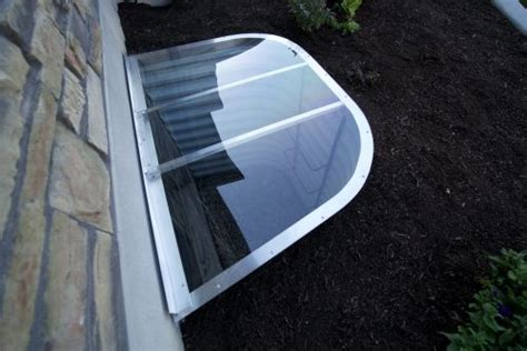 Designed to withstand a minimum 200 lb live load. Custom Polycarbonate Window Well Covers in Utah | Wasatch ...