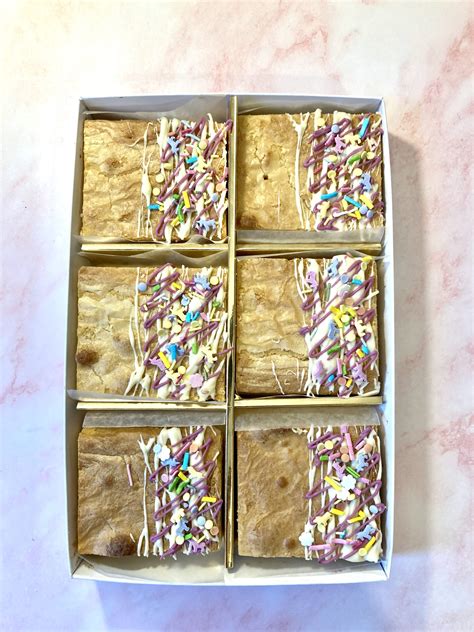 All of our cookies are hand rolled, finished and baked fresh daily. Unicorn Blondie Box | Tiny Beast Bakes