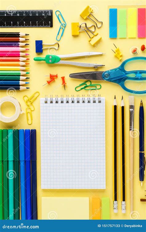 Flat Lay Composition With School Stationery On Yellow Background Stock