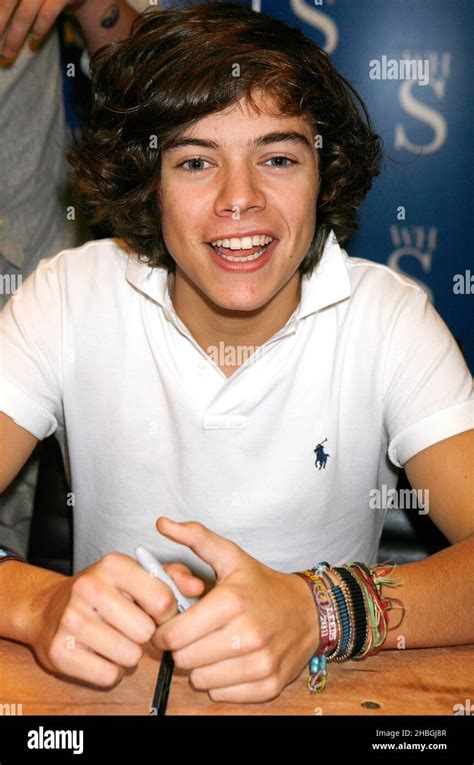 Harry Styles From One Direction Of X Factor Fame Signs Copies Of The