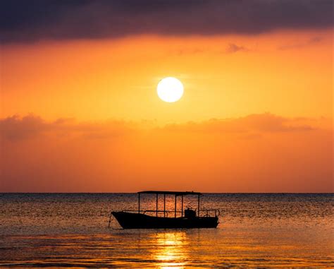 Wallpaper Boat Sea Sunset Sun Water Dusk Hd Widescreen High Definition Fullscreen