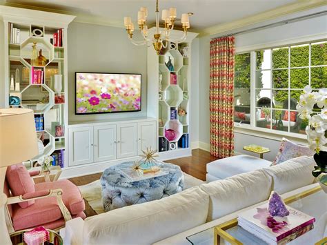 Consisting of black metal pieces and soft furnishings. Eclectic, Feminine Living Room is Bright, Colorful | HGTV