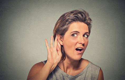 Surprised Young Nosy Woman Hand To Ear Gesture Carefully Intently