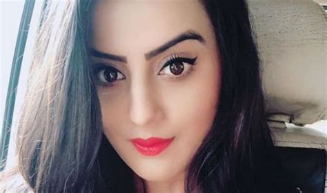 Bhojpuri Sensation Akshara Singh Looks Her Sexiest Best In Black Track Pants And Red Hot Lips