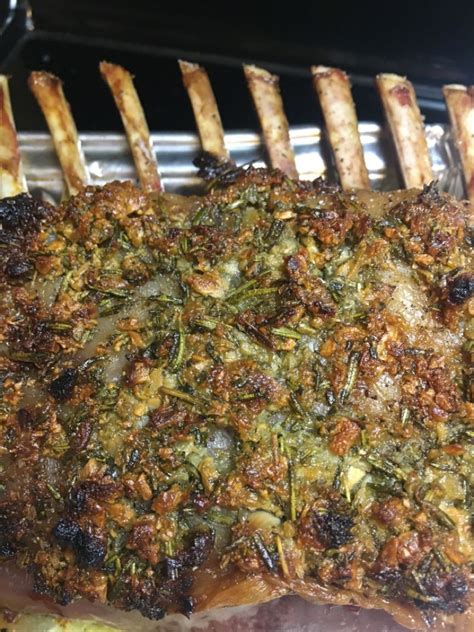 Season lamb with salt and pepper. ROSEMARY & GARLIC OVEN ROASTED RACK OF LAMB