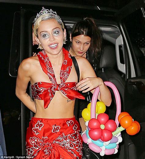 Miley Cyrus Falls Victim To Double Wardrobe Malfunction As She Suffers A Nip Slip In Daring Mesh