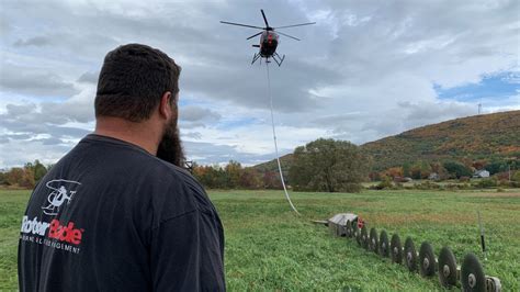 Helicopter With Hanging Saws Trims Trees Along Vt Train Tracks Necn