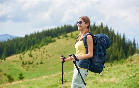Premium Photo Beautiful Happy Woman Backpacker Hiking In Mountain