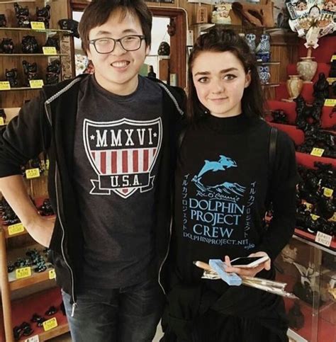 Maisie Williams With A Fan When She Was Doing Work For The Dolphin