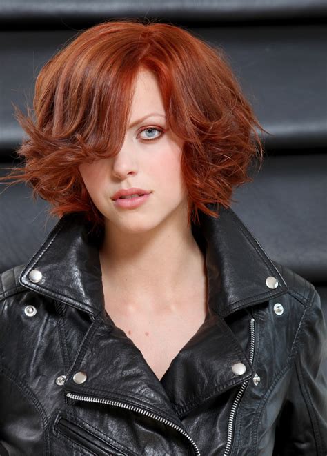 Not only do short hairstyles add volume to your strands, but the haircut is also so low maintenance, giving you a red carpet look with half the time and effort. Short layered bob styled with curls for a party hairstyle
