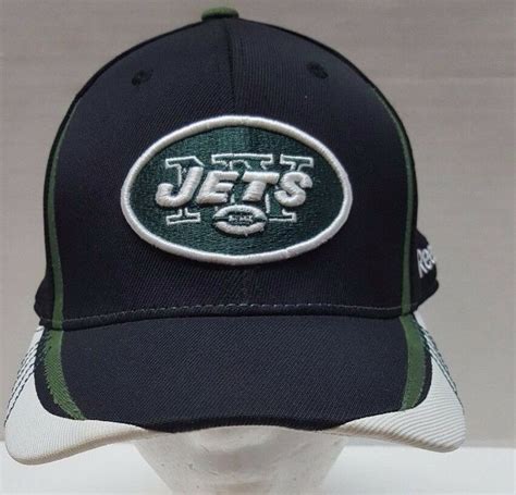 Wrap it around your head at the point where the hat will sit (about an inch/2.5cm above your eyebrows). New York Jets Black Hat Size Small/Med Reebok NFL ...