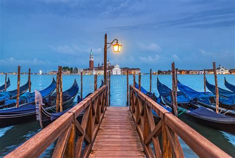 Evening Venice Seascape With Gondolas At Moorings Light Of Lantern At