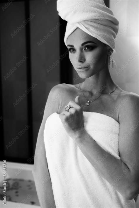 Black And White Photo Of Sensual Woman After Bath Or Shower Standing In Her Bathroom Spa Skin