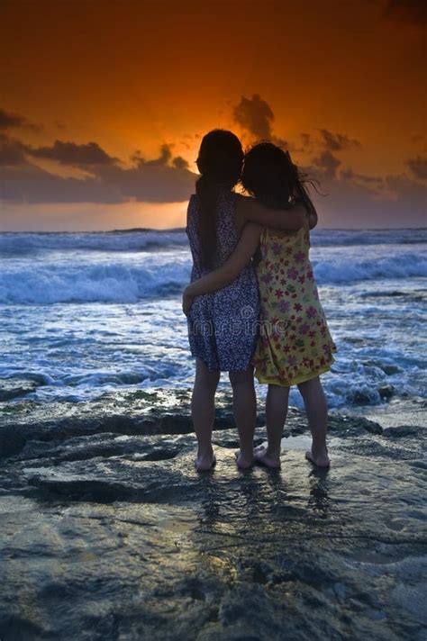 Girls Beach Sunset Stock Photo Image Of Leisure Embrace 5414510