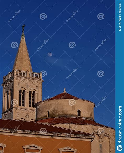 Top Of Crkva Sv Donata Church On Blue Sky Background With White Moon