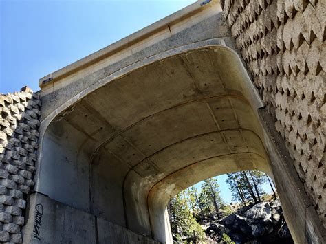 hike abandoned train tunnels covered in graffiti at donner summit
