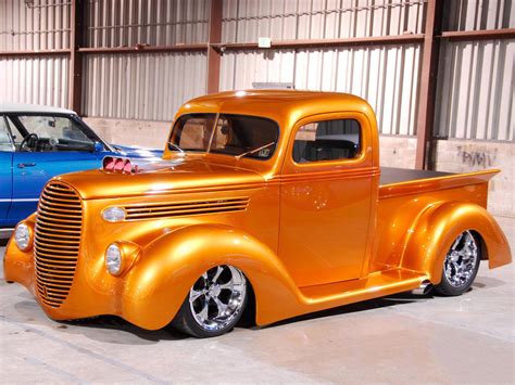 Download Metallic Orange Old Ford Truck Wallpaper