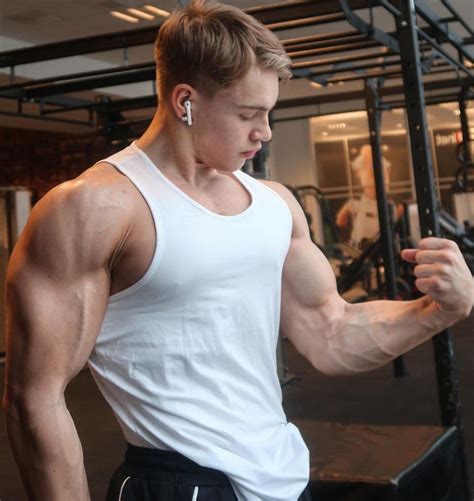 Young Blond Muscular Gym Hunk Oliver Forslin Biceps Flex