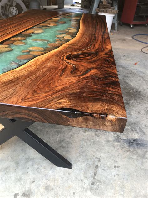 Maybe you would like to learn more about one of these? River table wirh walnut and river stone live edge coffee ...