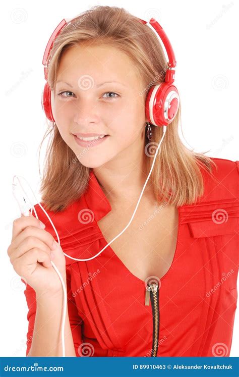 Музыка милого девочка подростка слушая на ее наушниках Стоковое Изображение изображение