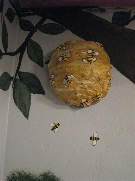Exam Room 1 3d Paper Mache Beehive With 3d Bees Hanging Off Of The