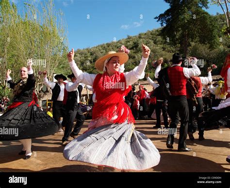 Portuguese Folk Dancers In Traditional Costume At The Festa Da Fonte