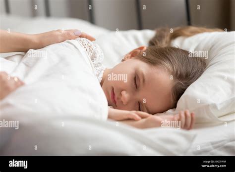 Mom Hands Touching Sleeping Kid Daughter Waking Up Little Child Stock