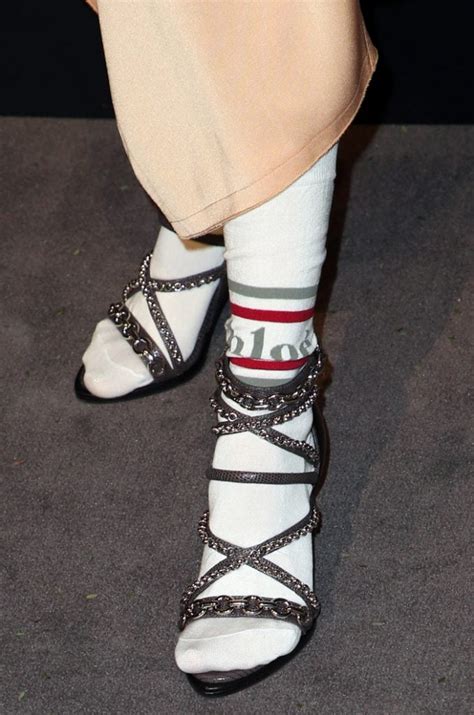 Debby Ryan Shocks In White Socks And Victoria Wrap Chain Sandals