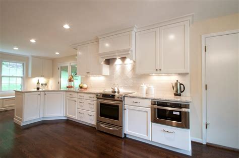 In the early years, backsplashes were often colorful with fruit and vegetable graphics adorning 4×4 ceramic tiles. 8 Maple Kitchen Cabinets And White Countertop And Brick ...