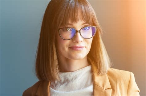 Premium Photo Portrait Of Woman Wearing Eyeglasses