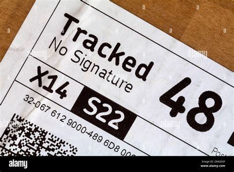 Tracked No Signature Label From Royal Mail On Package Parcel Stock