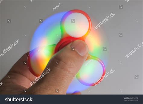 Hand Playing Fidget Spinners Stress Relieving Stock Photo Edit Now