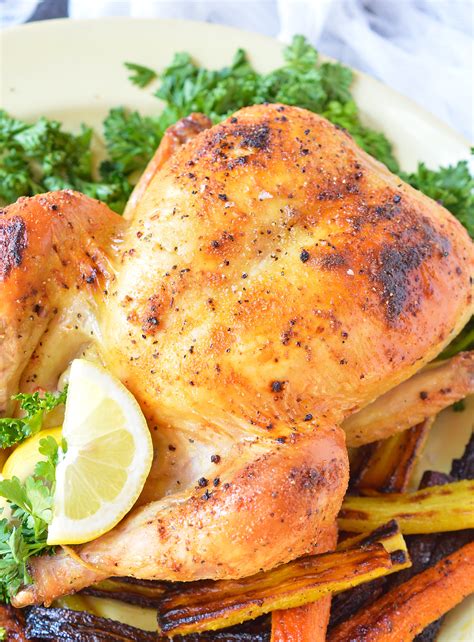 Place the whole chicken into a medium sized baking pan. Oven Roasted Whole Chicken - WonkyWonderful