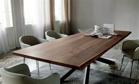Modern dining tables are known for being available and made of different sizes, such as round, square, rectangular and even oval. Modern Dining Table Design by Cattelan Italia - steel base ...