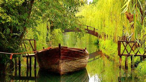 Boat In Calm Lake Riverbank Shore Quiet Greenery Wollow Trees