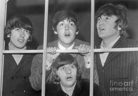 The Beatles Making Faces At Window By Bettmann