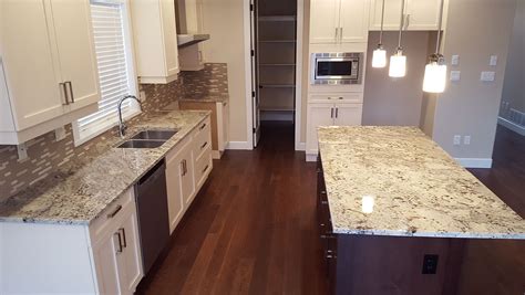 Patterned beige, gold, and brown granites blend well with just about any color scheme. Top 25 Best White Granite Colors for Kitchen Countertops ...