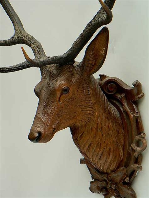 Carved deer head wall decor. fine carved wood deer head ca. 1900 .... not fond of real animal heads staring at me from the ...