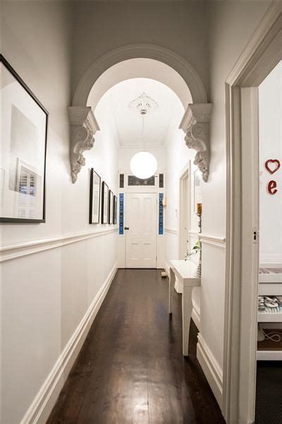 There are a variety of wall sconces that go with this type of hall lighting is functional and allows you to customize the light flow throughout the space. How High Do I Hang Pictures in My Hallway? | Victorian ...