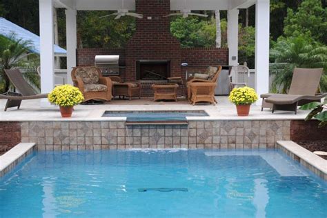 Outdoor Living Area By Swimming Pool And Spa In Jacksonville Florida