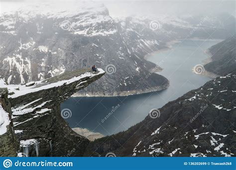 Trolltunga Cliff Under Snow In Norway Scenic Landscape Stock Image
