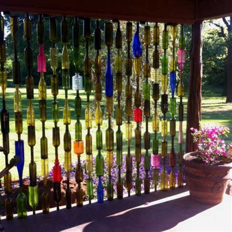 15 Terrific Diy Glass Bottle Yard Decor That Will Impress You The Art In Life Wine Bottle