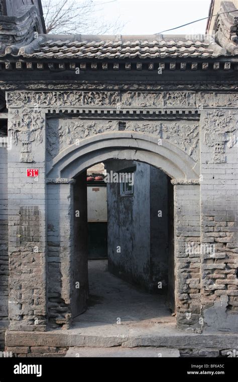 Hutong Gate With Elaborate Brick Carving Beijing China Stock Photo