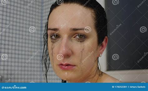 Sensual Woman With Dripping Makeup Cries In The Bathroom Portrait Close Up Stock Video