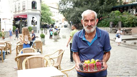 Poor Old Man Sells Fruit On A Street Of Tbilisi Georgia Stock Video Footage 00 08 Sbv 337096484