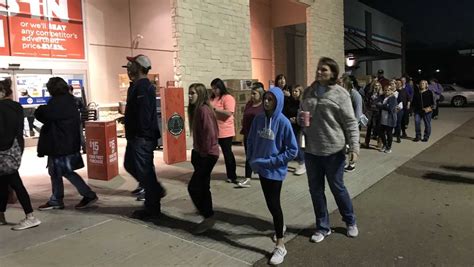 What Shops Are Taking Part In Black Friday - People line up for Black Friday deals