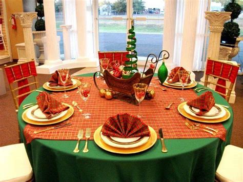 Christmas Centerpiece With Green Christmas Tree And Ornaments In Sleigh