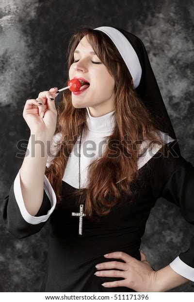 Photo De Stock Young Sexy Nun Stockings Licking Red 511171396 Shutterstock