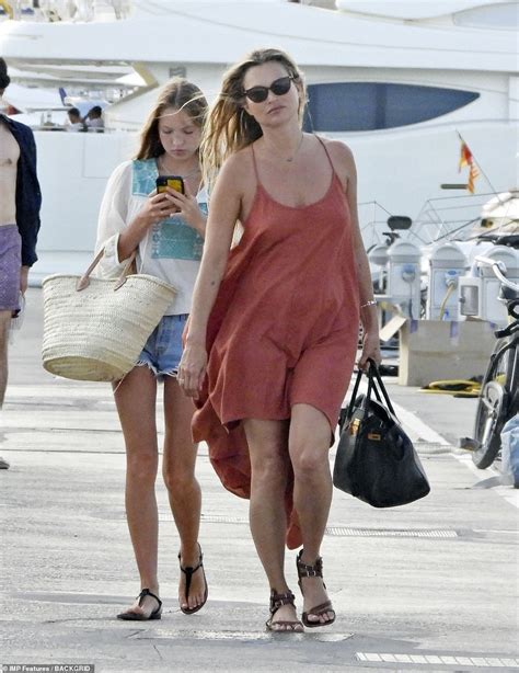 Kate Moss 46 Wears Tiny Black Bikini On Yacht In Ibiza Daily Mail